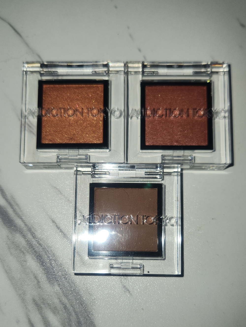 Addiction Tokyo Eyeshadow Trio - Carnelian, Retro Crush, And Cappuccino
